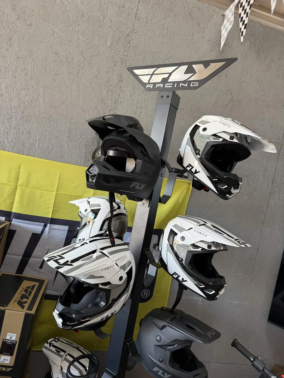 Full-face helmets on the showroom helmet rack